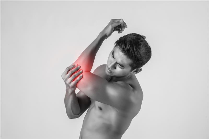 portrait-muscle-man-having-elbow-pain-isolated-white-background